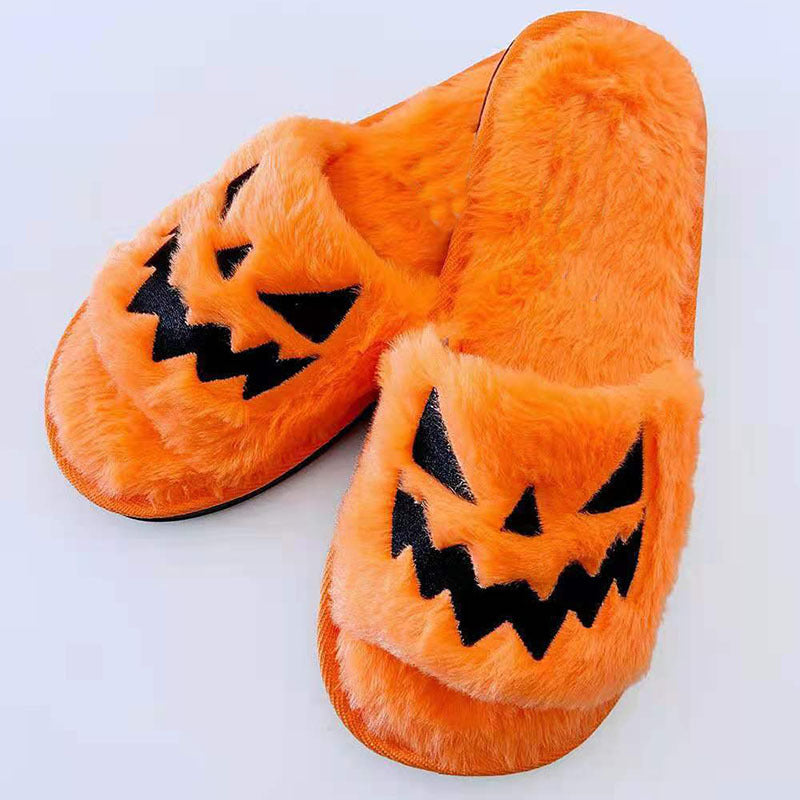 Acogedoras pantuflas de casa con diseño de calabaza de Halloween